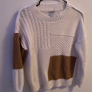 Cute sweater with brown patches